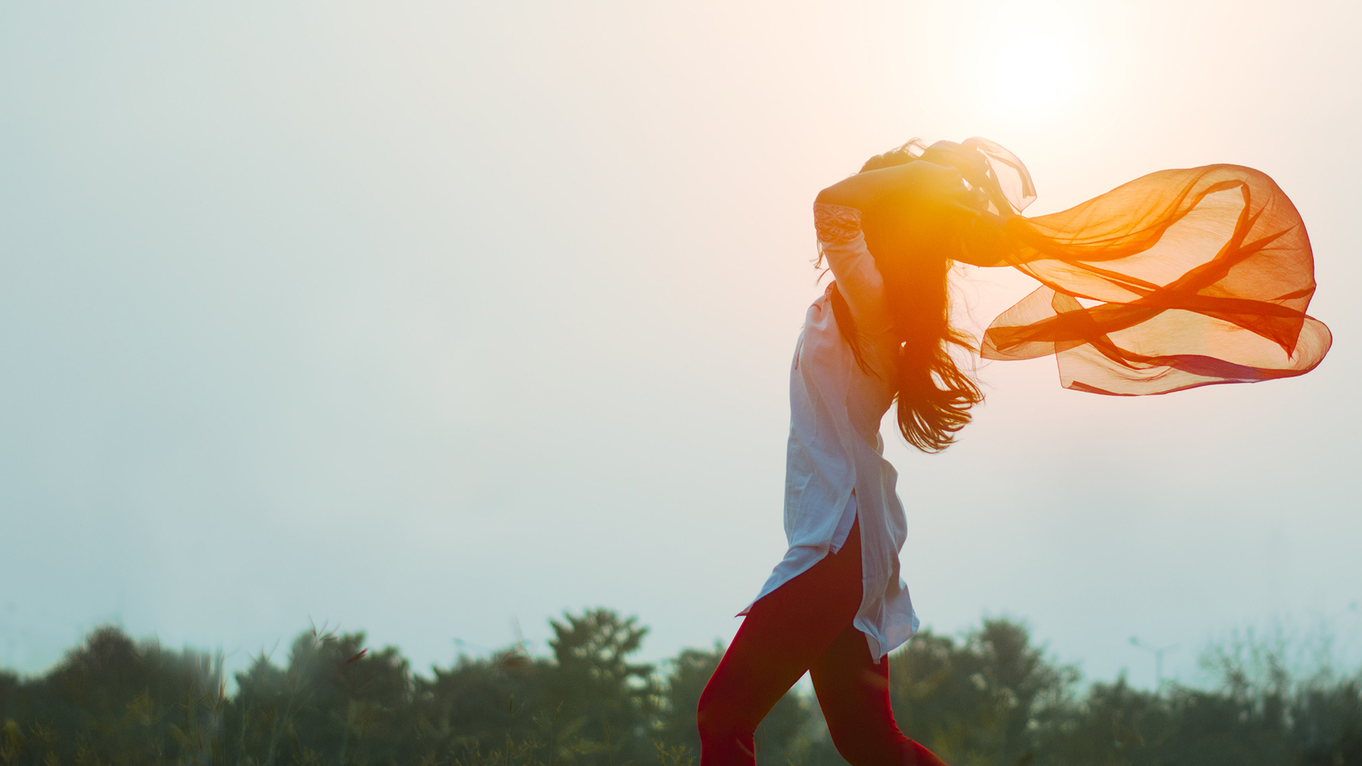 Woman-Walking-in-Wind