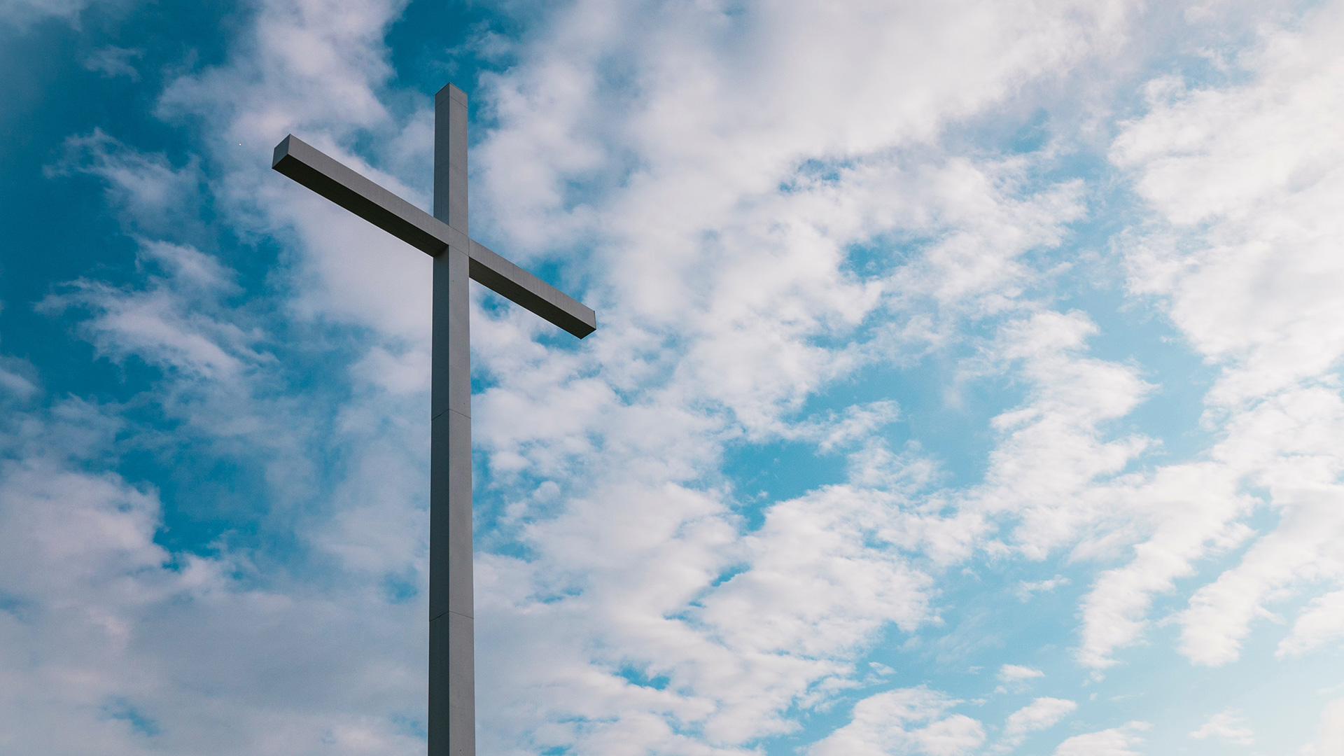 landscape-shot-of-white-cross-during-daytime