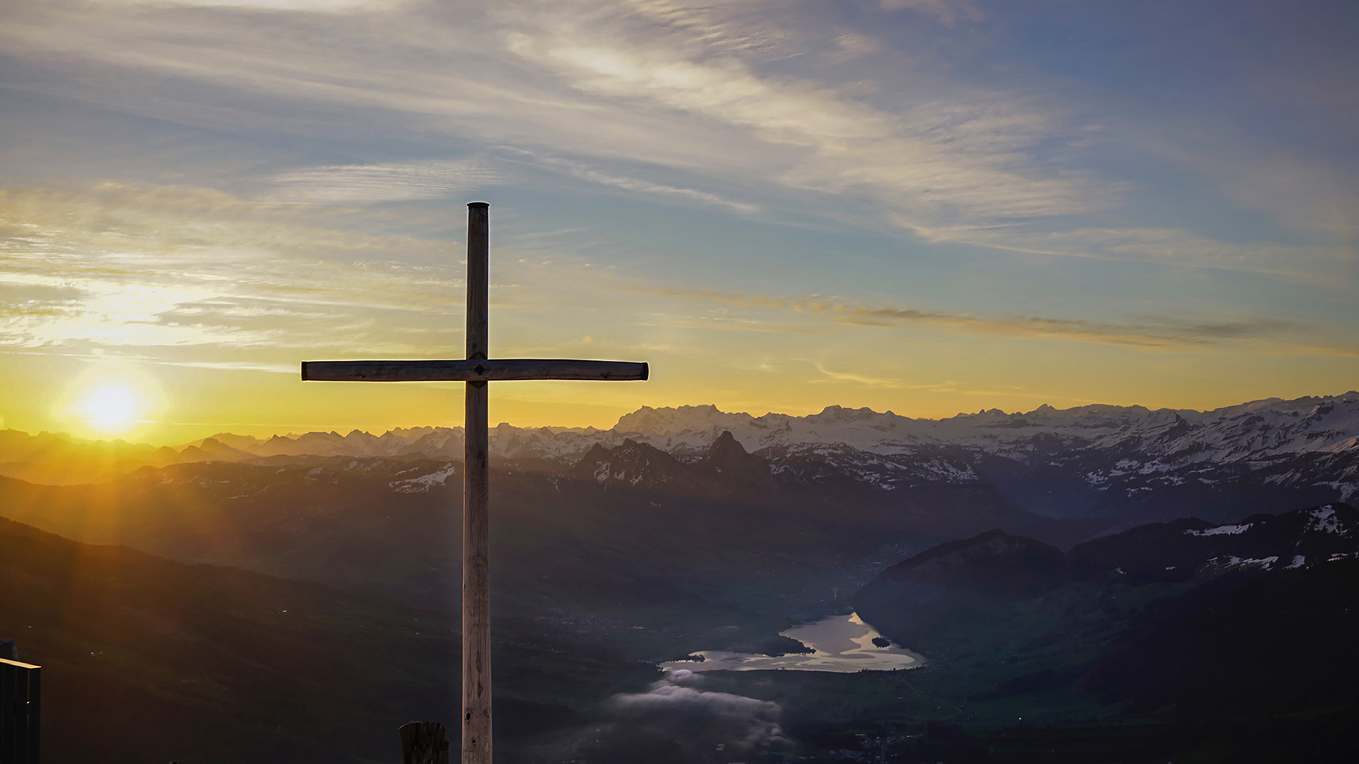 brown-cross-on-mountain