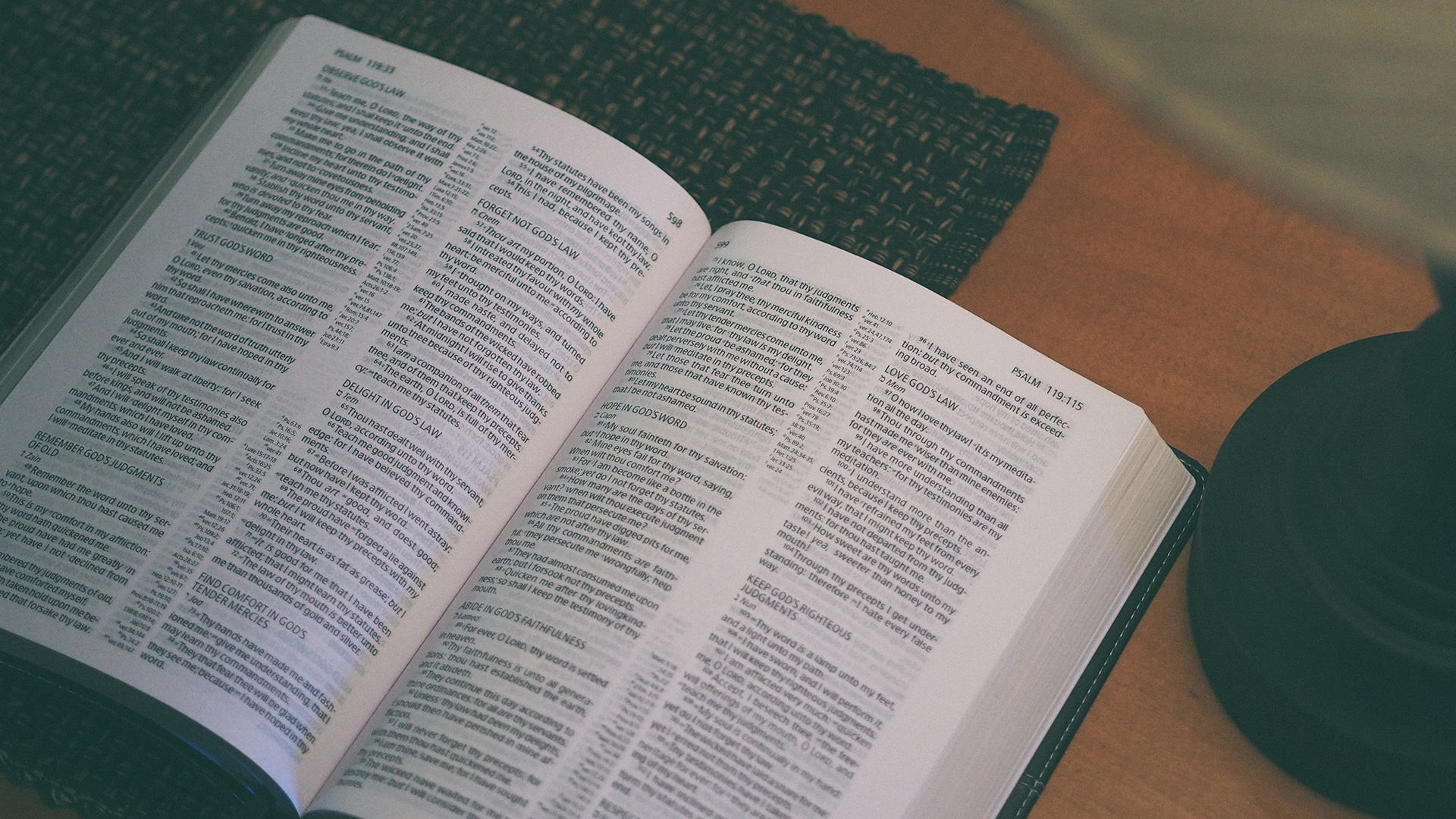 white-book-beside-black-table-lamp-Psalm-119