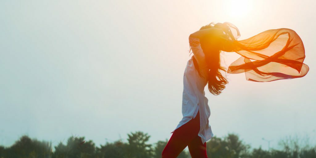 Woman-Walking-in-Wind