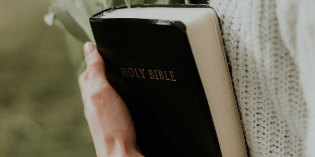 woman-holding-Holy-Bible